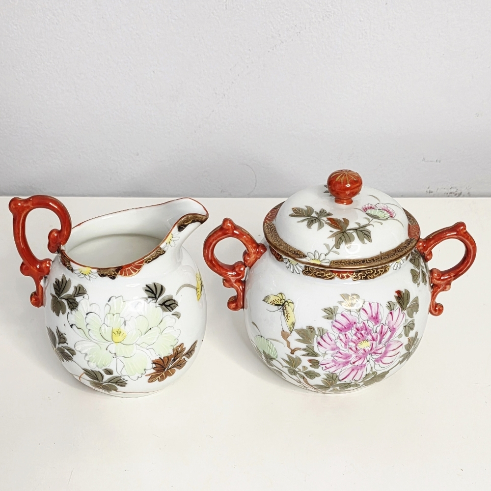 Antique Japanese Kutani Porcelain Floral Sugar and Creamer Set with Red Handles